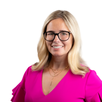 Leslie Martin, metro Detroit Realtor® wearing hot pink dress on transparent background
